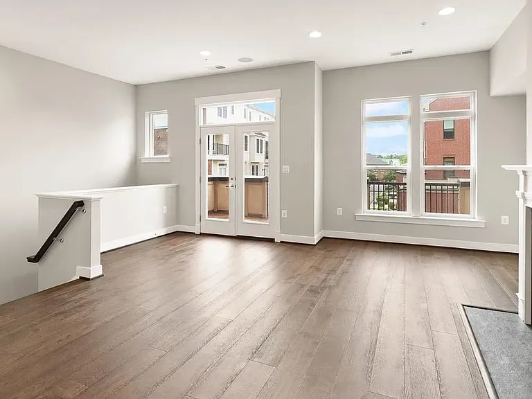View of living room with doors to the first deck