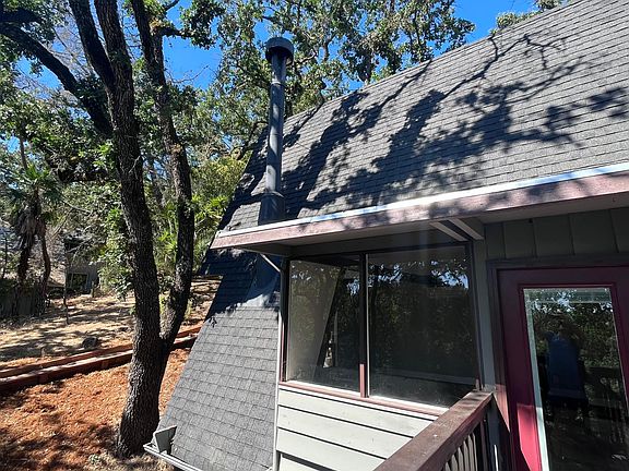 Side view from the balcony looking to the left of the property (we have since landscaped and can be seen at viewing)