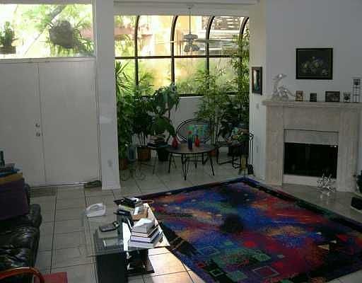 Living room w/fireplace/12 foot ceilings!