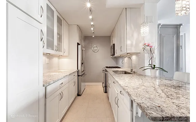 Sold by Douglas Elliman | media 13