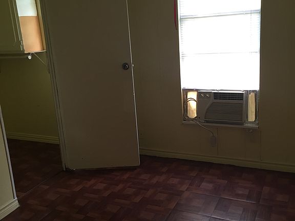 2nd bedroom with a walk in closet