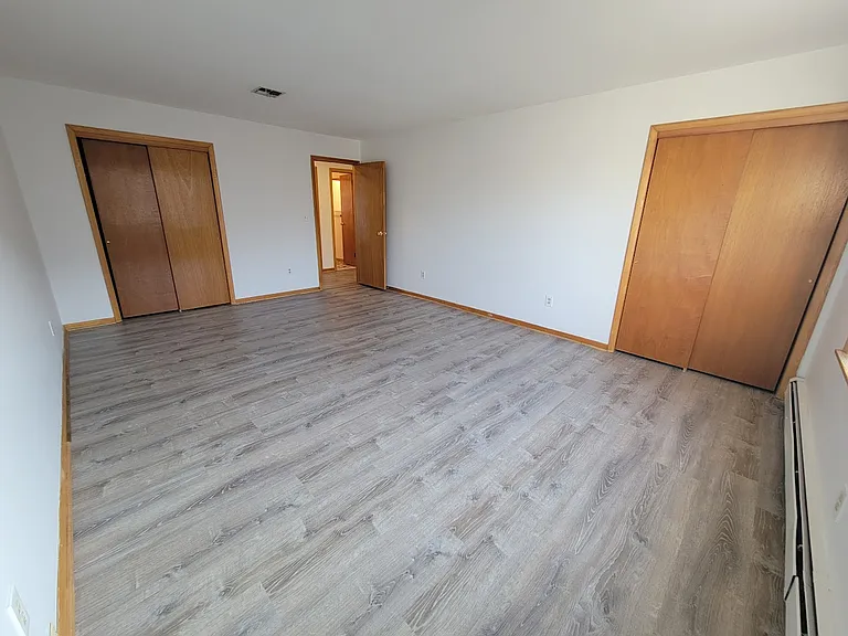Primary Bedroom 2 Closets 2nd Floor Freshly Painted and New Floors