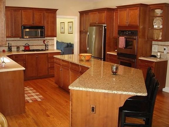 Kichen with hugh center island. All stainless steel appliances