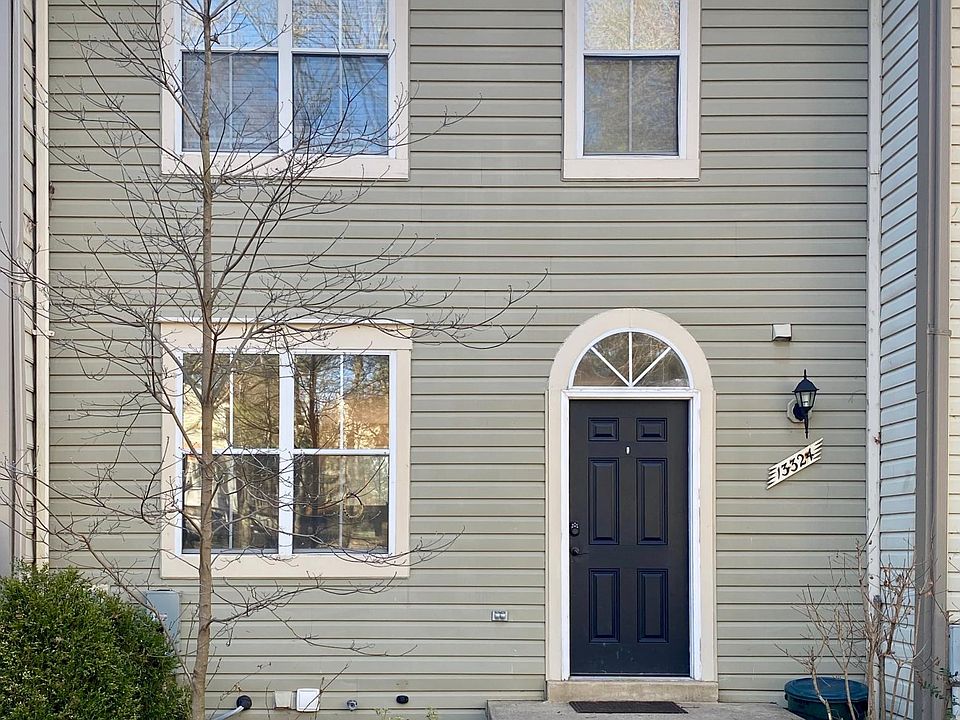 Front of home with beautiful pink dogwood