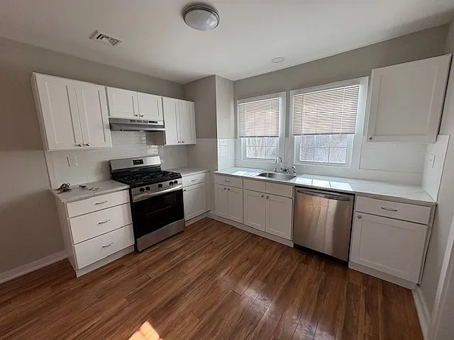 Fully updated kitchen with pantry and area for table
