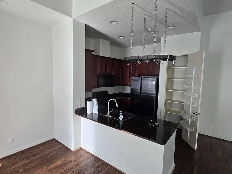 Kitchen includes a pantry for dry food storage.