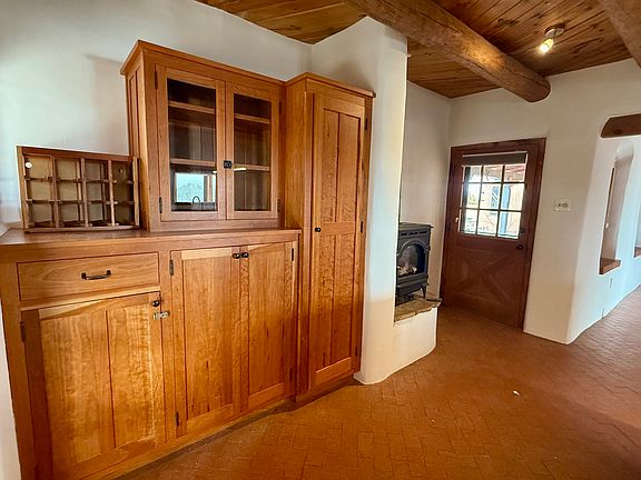 Custom built cherry wood cabinetry in the kitchen