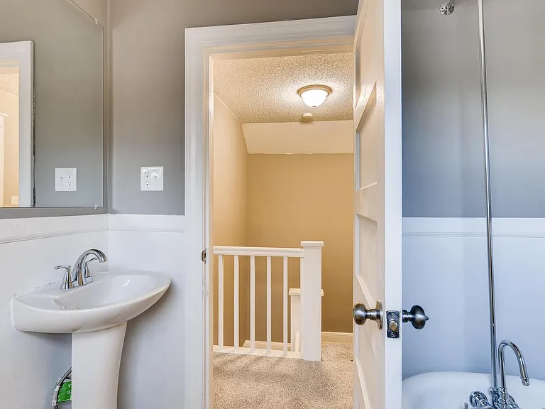 Shared bathroom upstairs between two upstairs bedrooms.