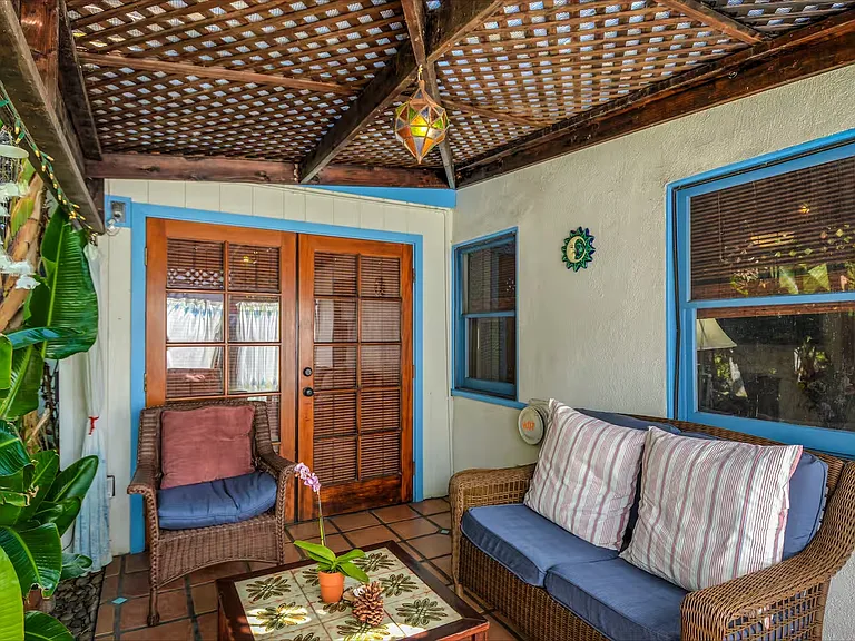 Bedroom French Doors (background) open out to Cabana Room (foreground)