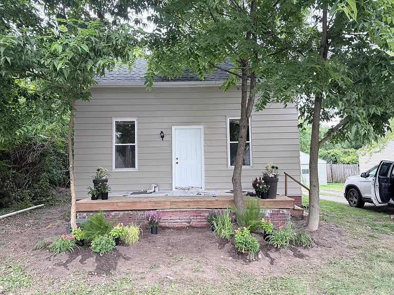 Exterior new paint. New landscaping in progress.