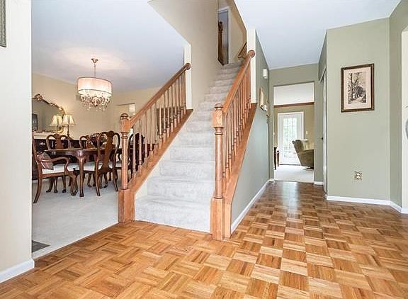Enjoy the spacious foyer and spindled staircase.