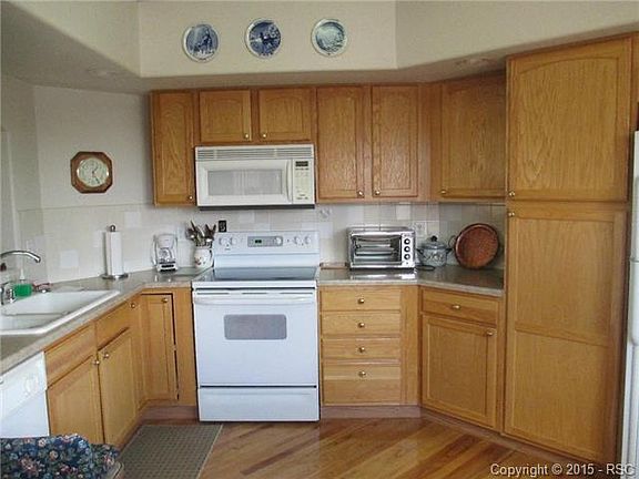 14x12 Kitchen with hardwood floor, bay window & all appliances.