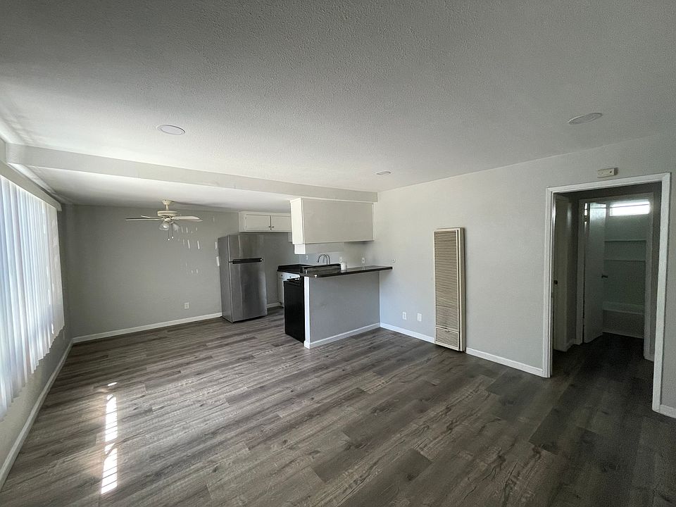 Spacious living room with recessed lighting