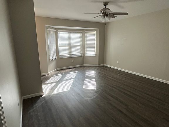 Living room w/ cute bay window