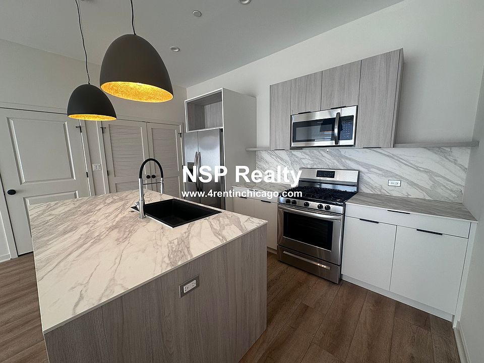 1st image of 3207 N Narragansett Ave #406