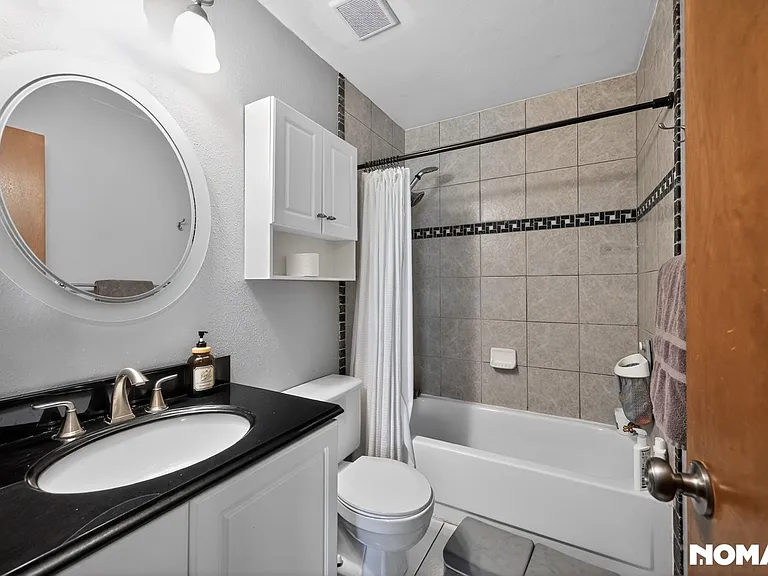 6913 Wolff St — Photo 33