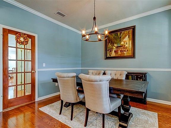 Dining Room with New Light Fixture-Refinished Real Hardwood Flooring