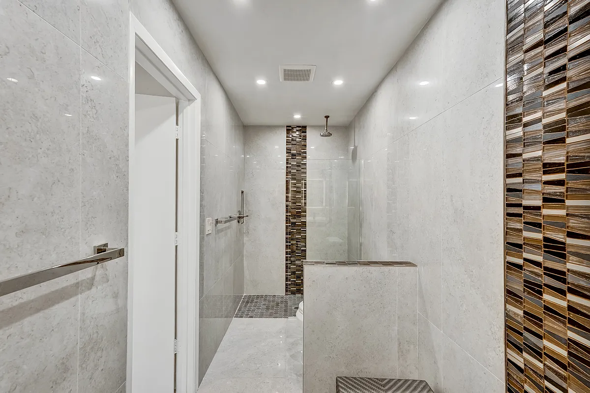 master bath, roll-in shower at end, 7 foot vanity behind - 3723 Glen Oaks Manor Dr