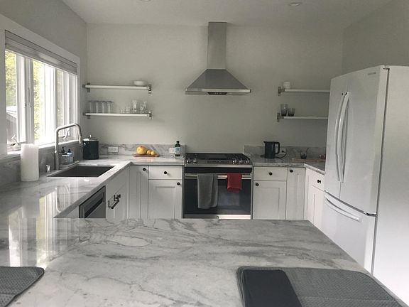 Updated kitchen with peninsula seating area.