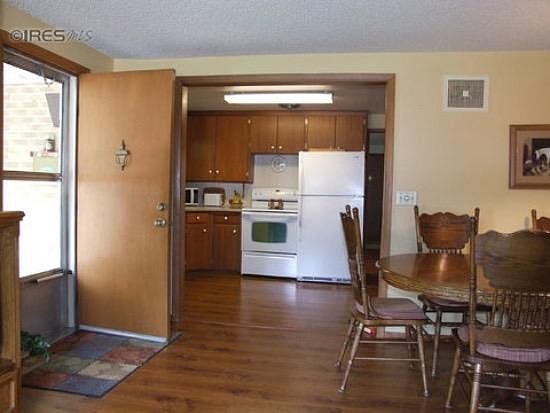 View of dining area and kitchen from the family room.