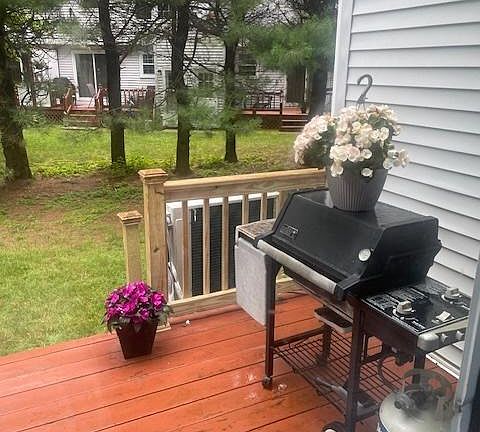 Back deck off the kitchen for grilling and relaxing.