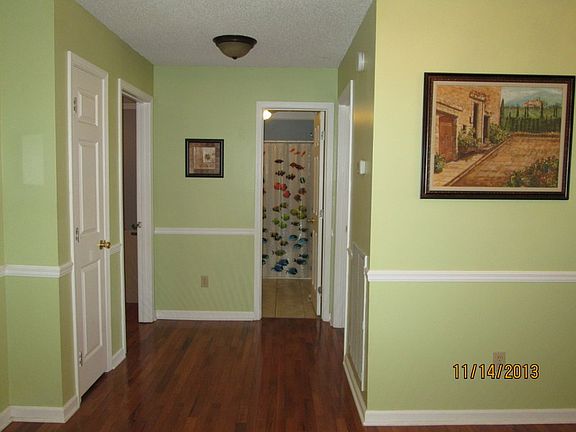 Hall to 2 bedrooms and guest bathroom