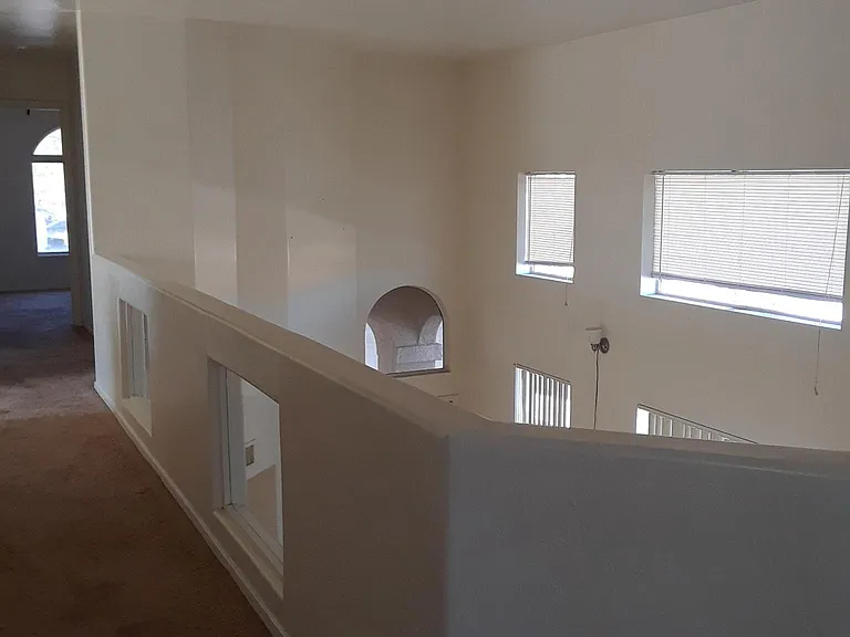 upstairs walkway /overlook the 
downstairs area