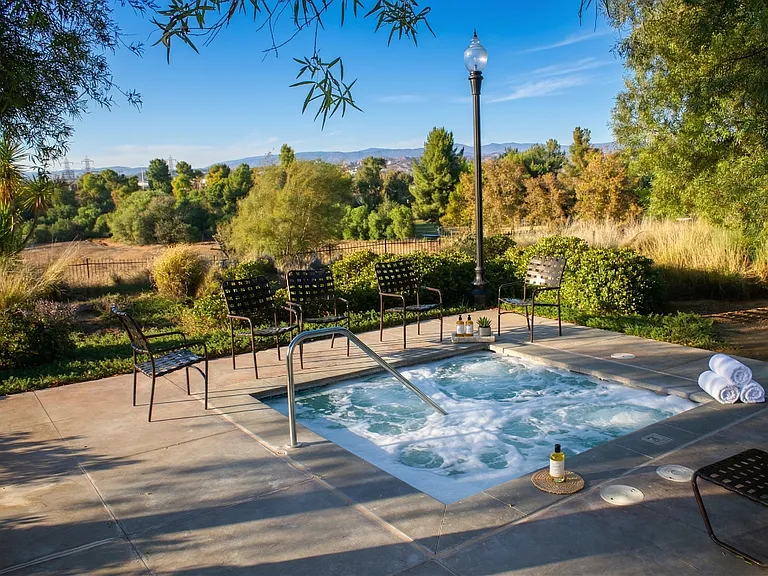Relaxing spa in gated Woodlands community with beautiful surroundings