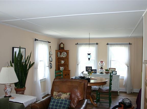Formal dining room, wood floors throughout