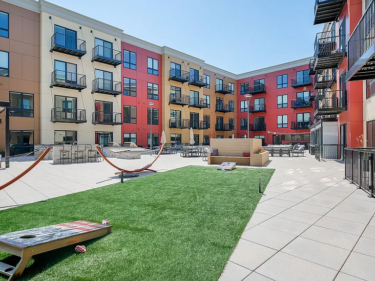 15,000 SF Amenity Deck with firepits, grills, outdoors TV's, bocce court, and pet run