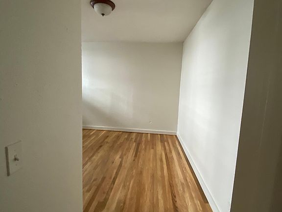 View into second bedroom off kitchen