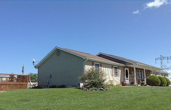 Front showing deck and pool