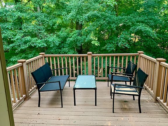 Outside deck with view of the woods. Main floor.