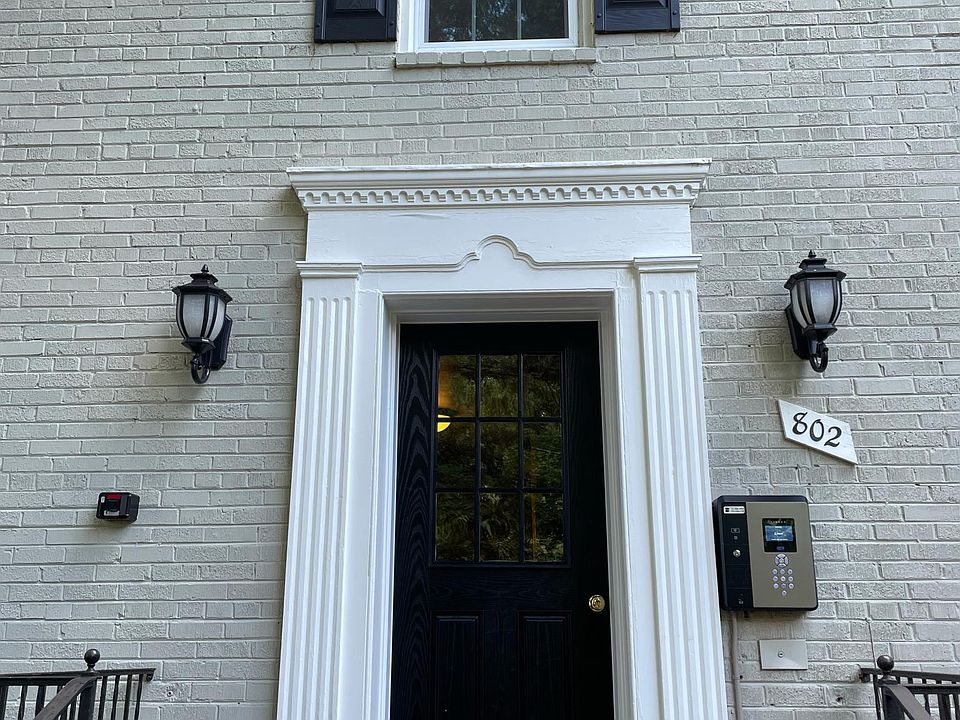 Building entrance. Unit on second floor to the left