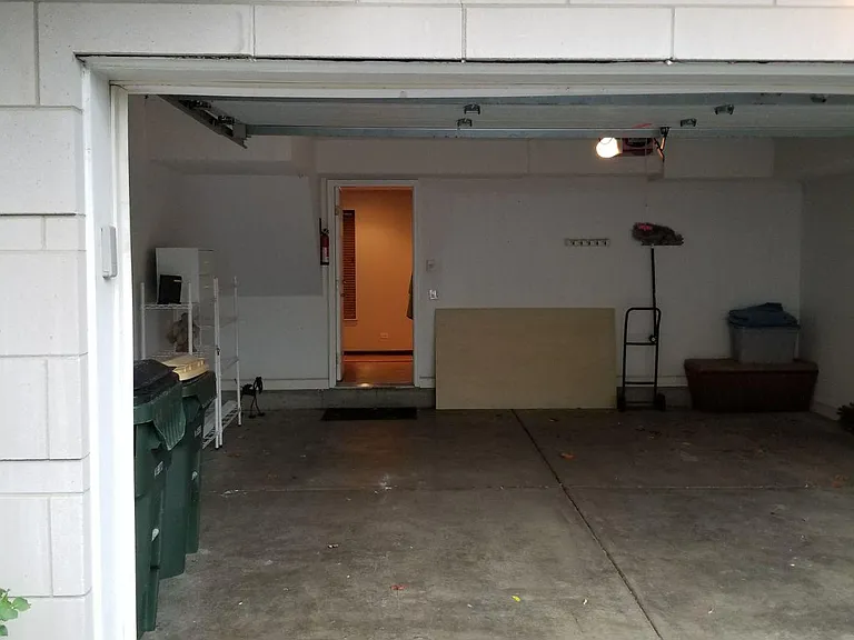 Private two car garage with Tesla charger