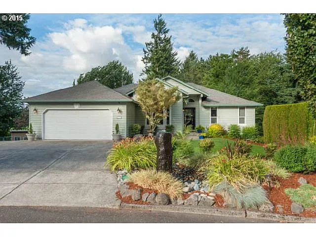 2215 NE Village Green Dr photo 1