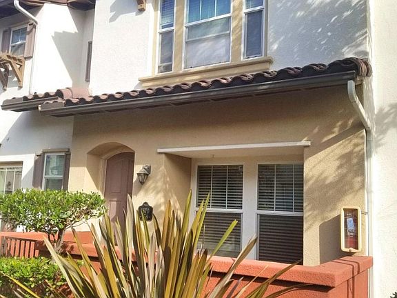 Cozy little gated yard at front entrance
