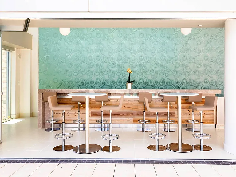 njoy drinks or a casual meal at the stylish poolside bar.
