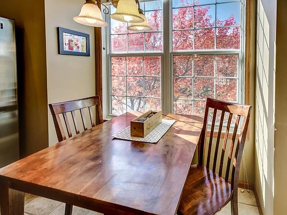 Small dining area within kitchen, another main dining area located off kitchen.