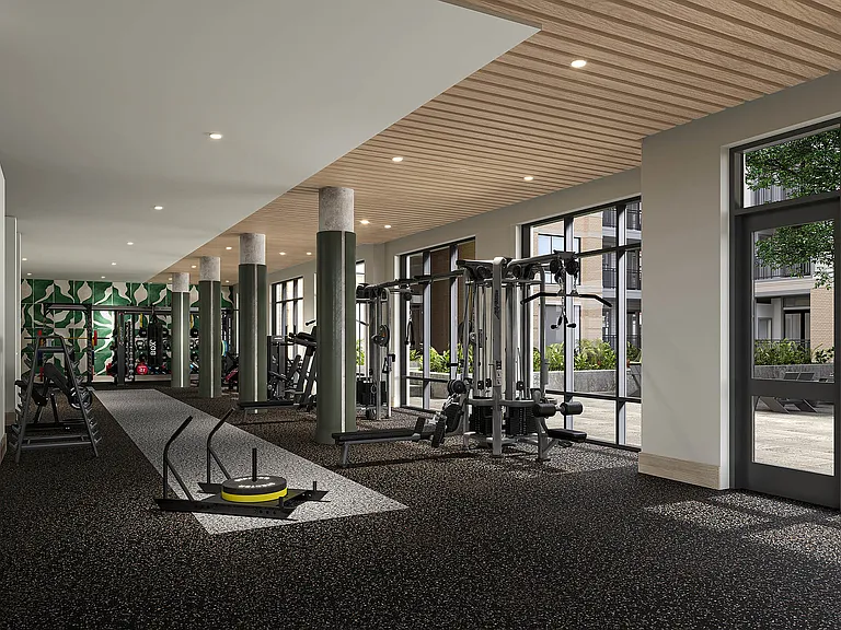 Fitness center overlooking pool courtyard