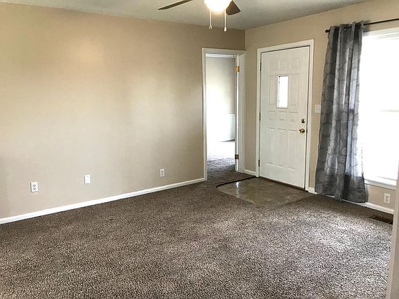 Living room, looking toward bonus room and front door