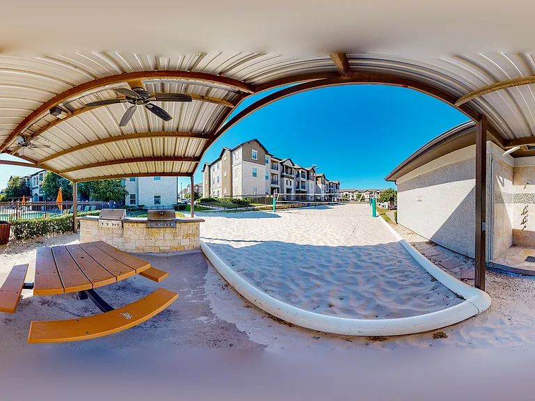 Beach Volleyball and Grill Area
