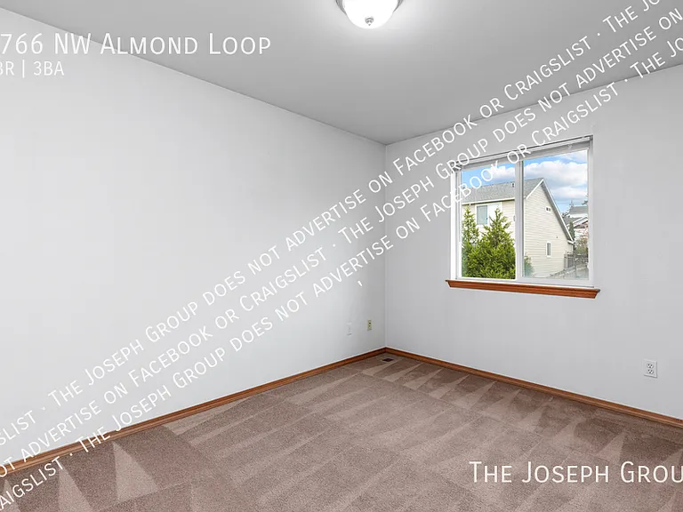 1766 NW Almond Loop — Photo 23