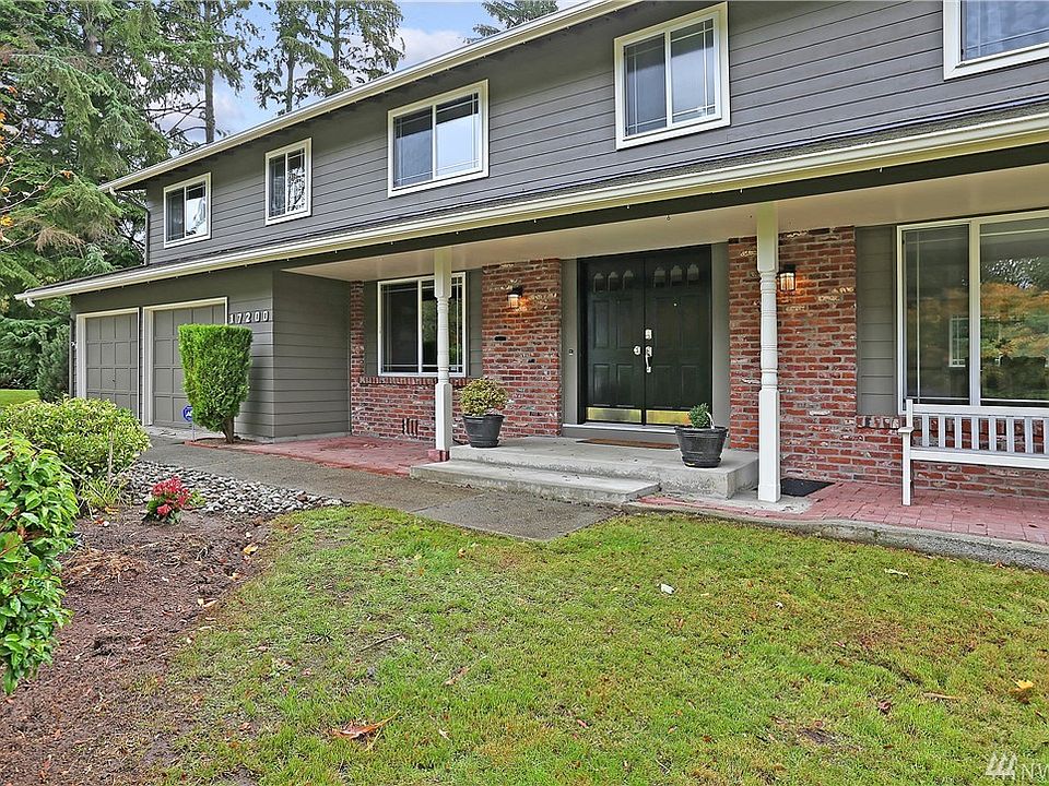 Front view of the home, beautifully landscaped.
