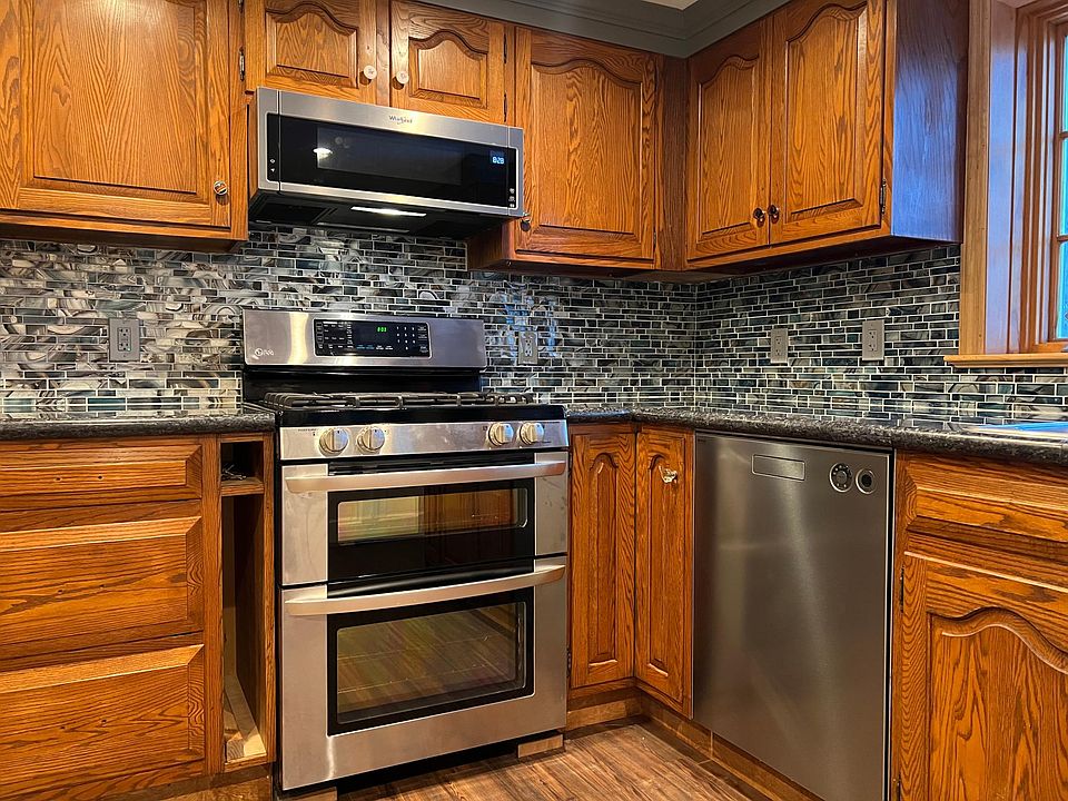 Granite countertops with a glass backsplash