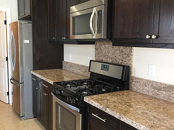granite counters - stainless appliances