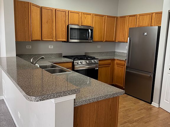 Kitchen with new ss fridge