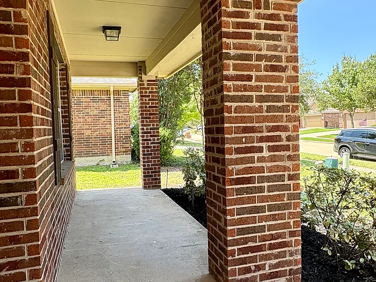 Hugh Covered Front Porch