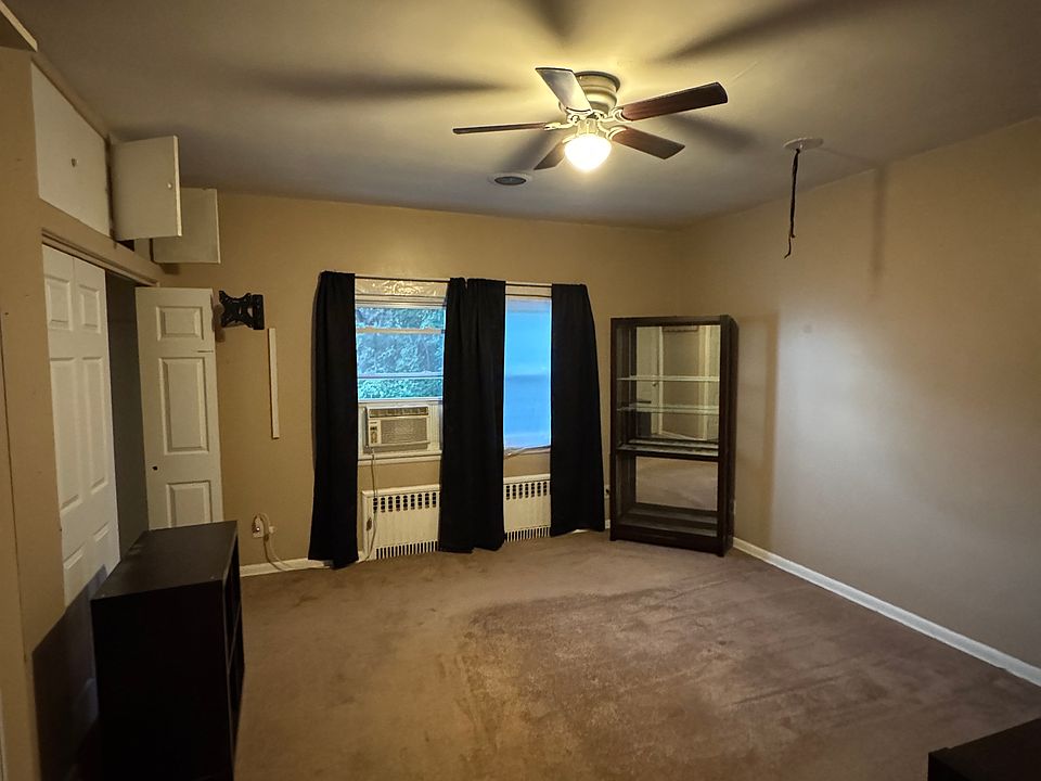 Bedroom with balcony attached