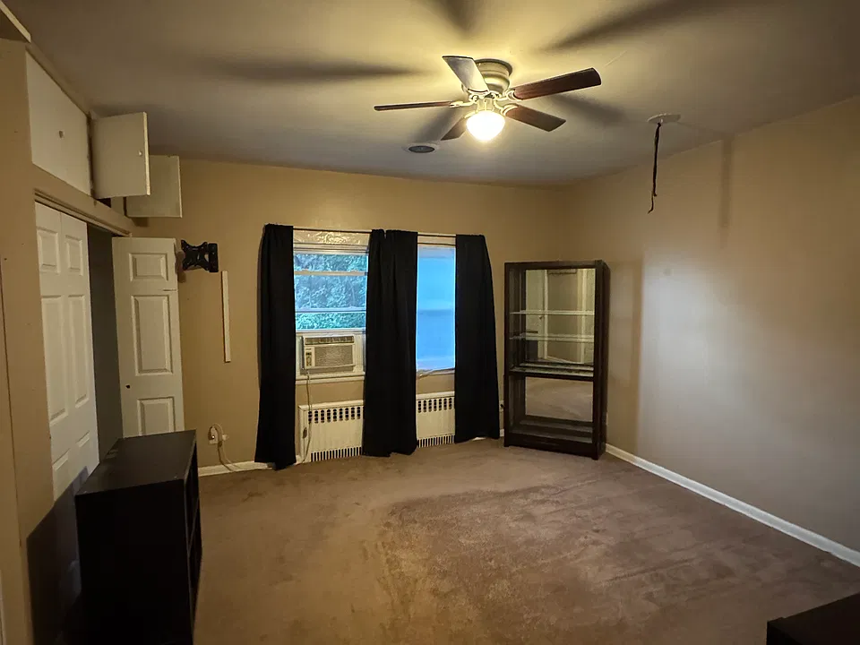Bedroom with balcony attached
